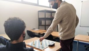 Motivación académica-ajedrez y finanzas