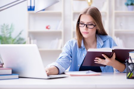 Young,Teenage,Female,Student,Preparing,For,Exams,At,Home
